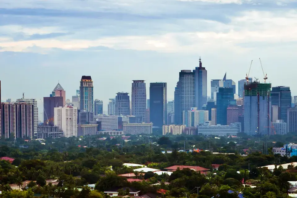 Makati skyline above tree-lined neighbourhoods